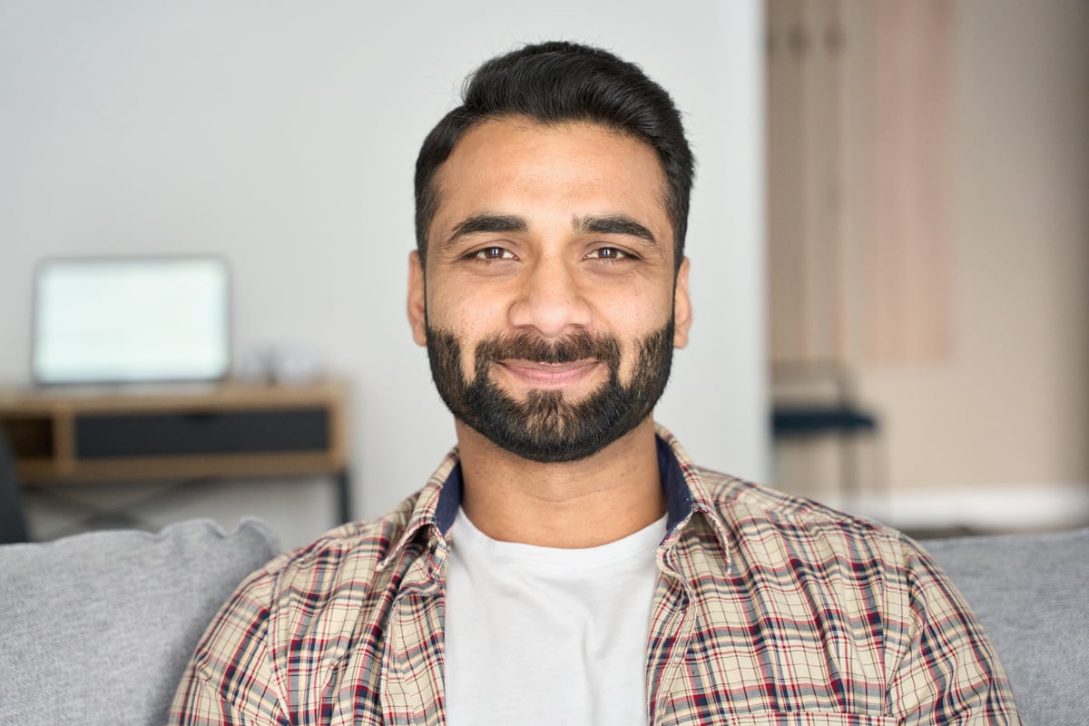 Headshot Portrait of Smiling Businessman 